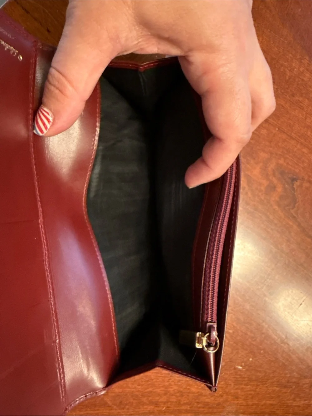 Salvatore Ferragamo Burgundy Leather Wallet with Gold Hardware